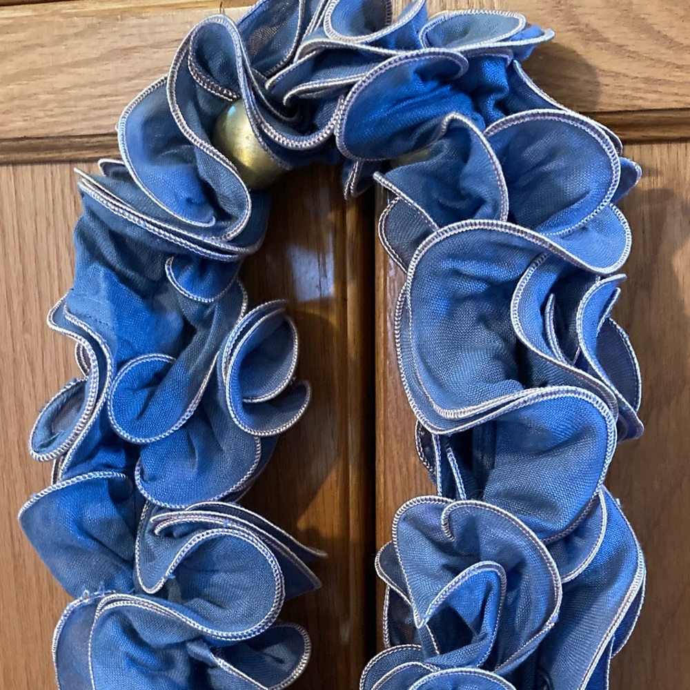 POWDER Ruffle Scarf in soft lavender with a pale pink trim.